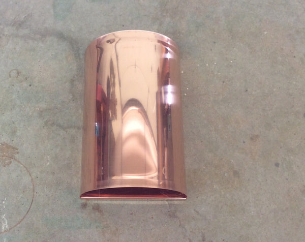 Copper light sconce by Mike Dumas Copper Designs Inc.