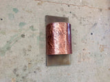 Copper light sconce with leather textured copper band + Steel backplate by Mike Dumas Copper Designs..